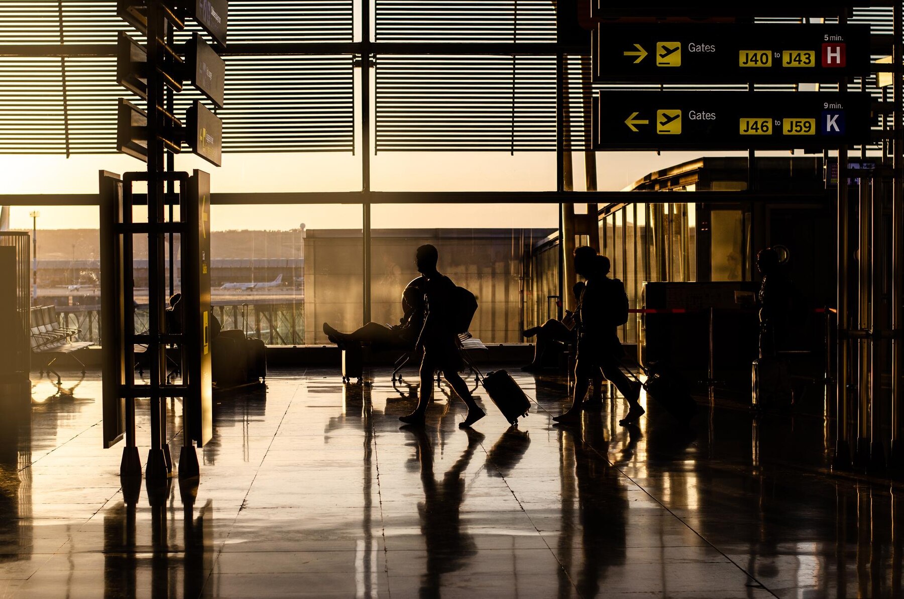 people walking inside airport terminal